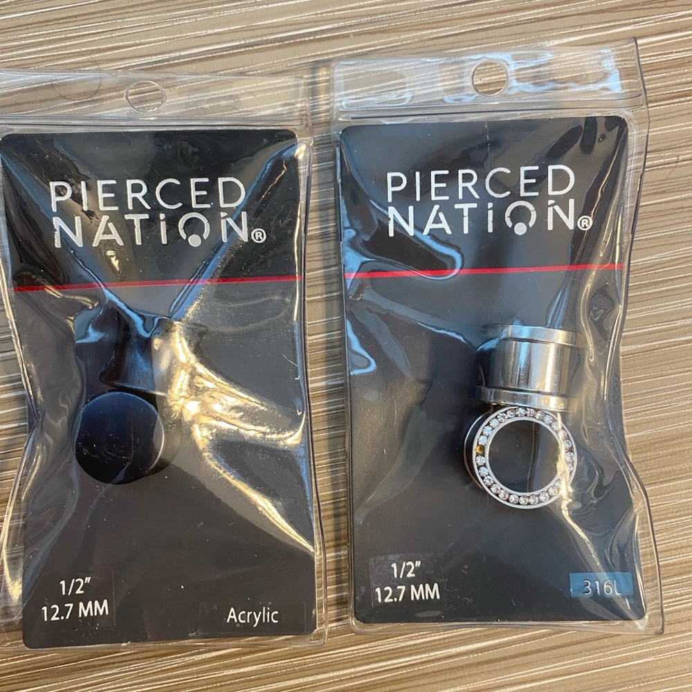 Two sets of 1/2in plugs. Never worn!